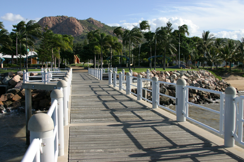 Townsville waterfront boardwalk with Castle Hill in the background